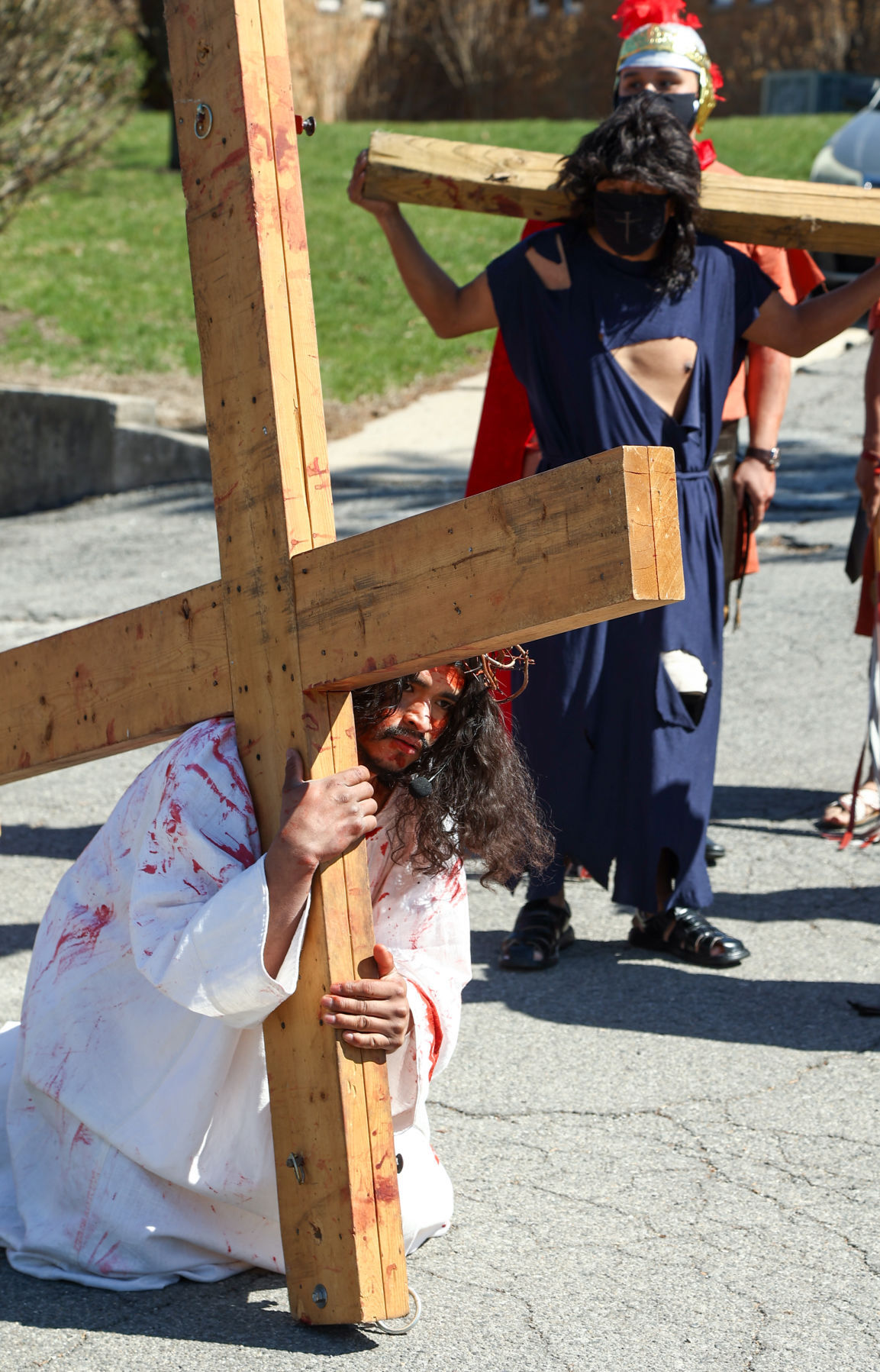 Parishioners of St. Francis Xavier do a re-enactment of the crucifixion of Jesus